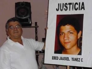 Ebed Yanes's father (link in Spanish). The 15-year-old was killed by the Honduran military. The case is one of 4 to be presented to the ICC.